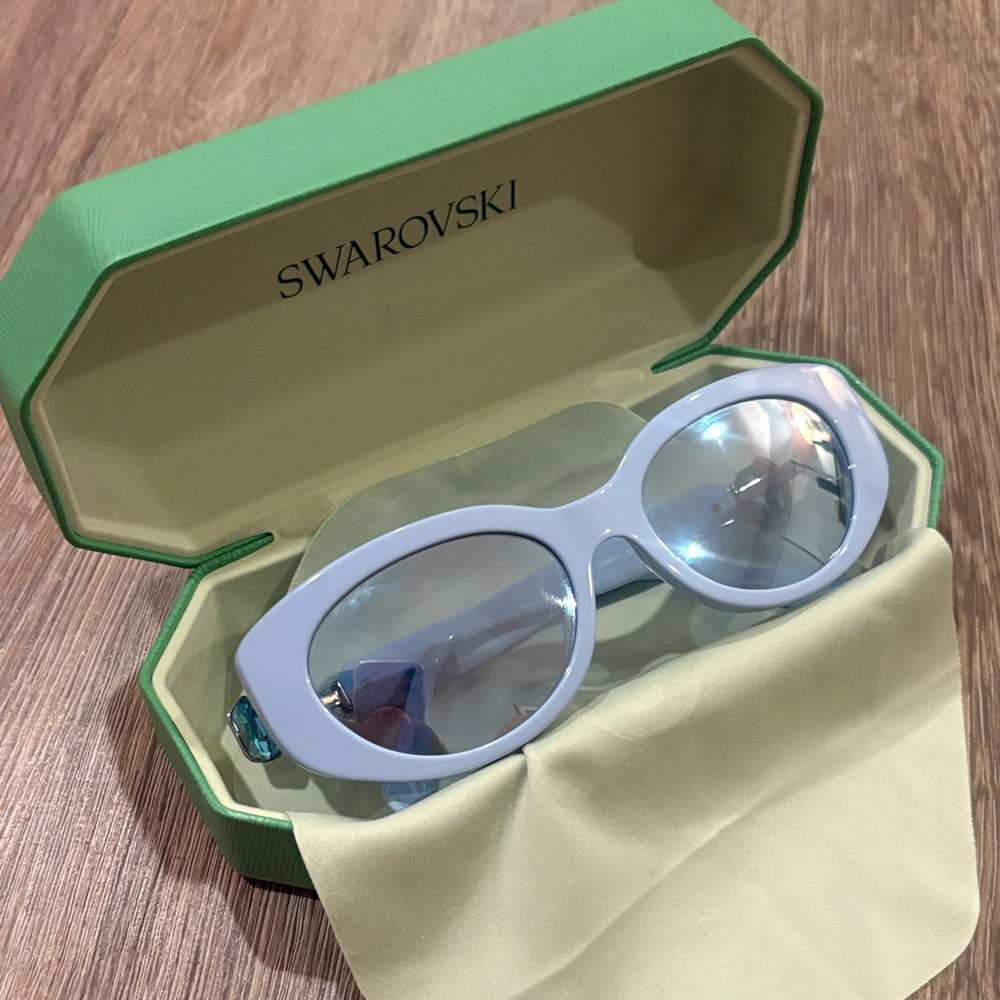 Swarovski Pastel Blue Oval Sunglasses with Mirrored Lenses